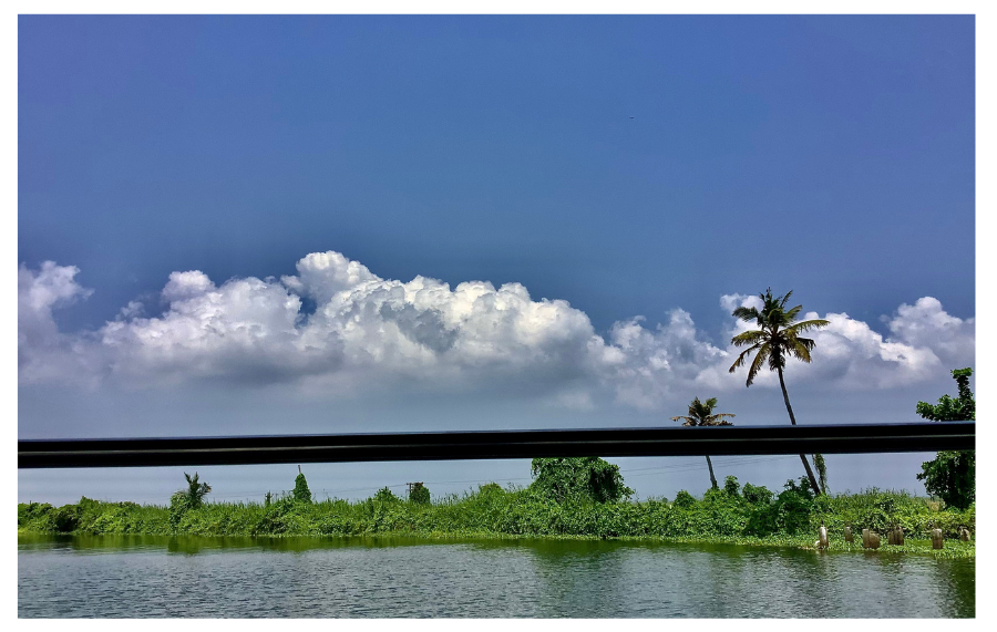 cloud floating over a dam 